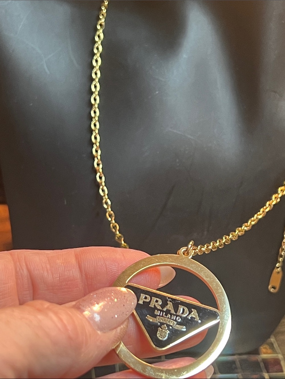 Up Cycled Gold-Tone Logo Circle Pendant Necklace with Black Enamel Triangle - Picture 6 of 6
